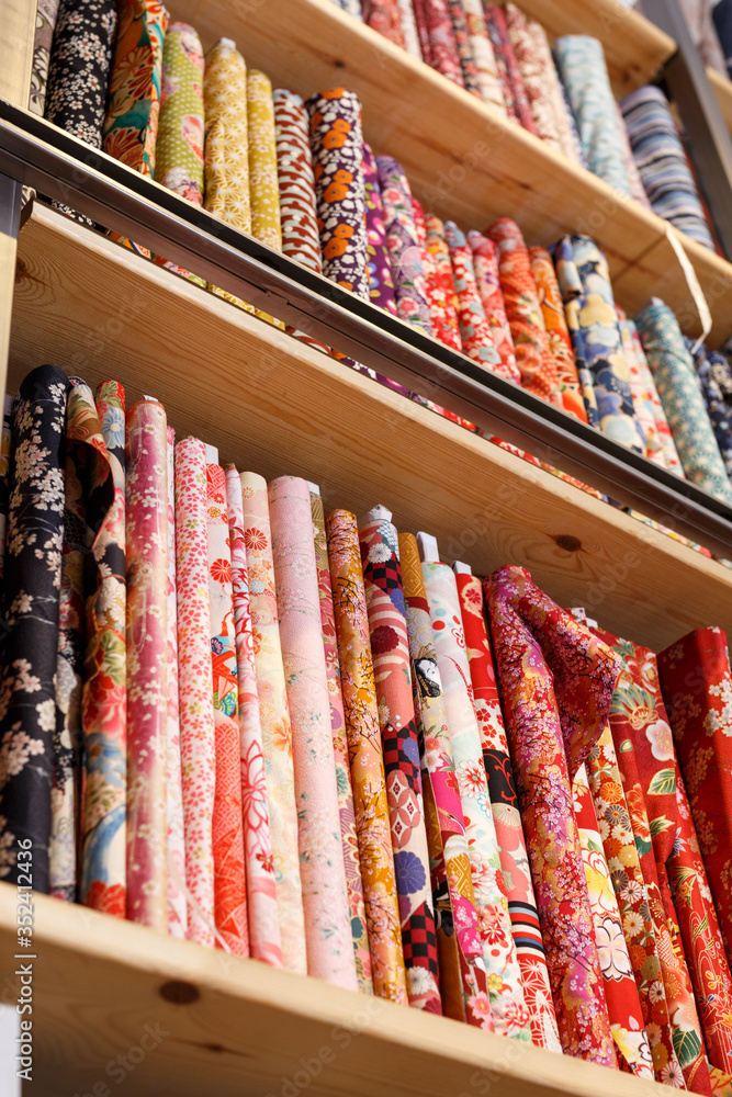 Rolls of fabric for sale in shop