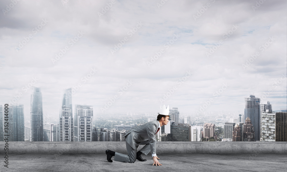 King businessman in elegant suit running on building roof and business center at background King businessman in elegant suit running on building roof and business center at background