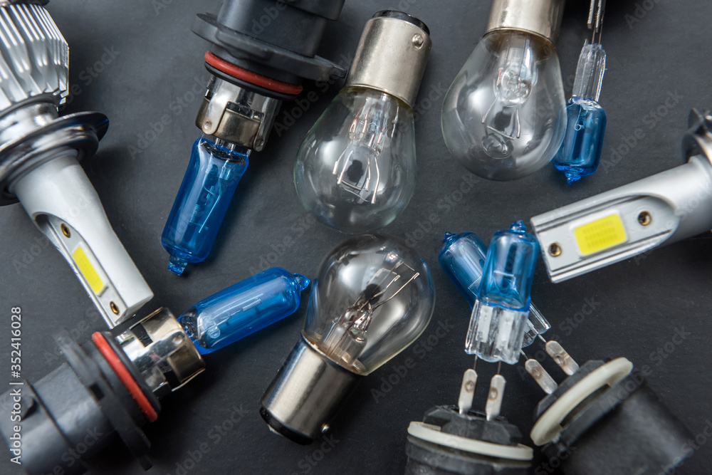 different headlight lamp on dark background. Modern diod halogen and other lamp glass different headlight lamp on dark background. Modern diod halogen and other lamp glass