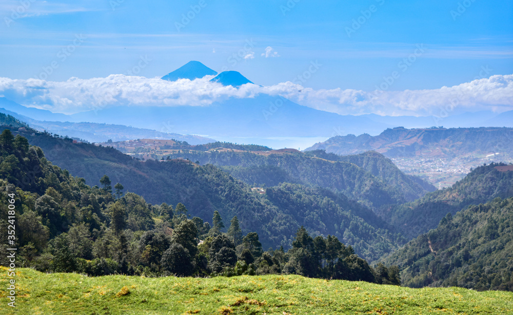 Lake Atitlán landscape seen from the road, you can see the volcanos and the lake