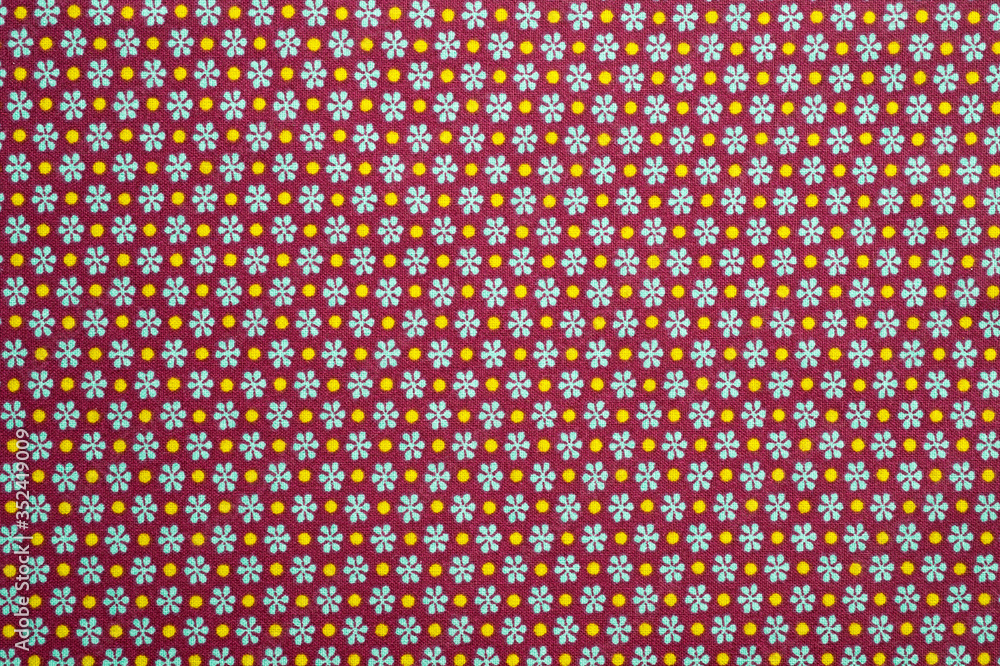 Close-up cotton lightweight fabric with a fine brown print. Background for the texture of outerwear and fashion. Close-up cotton lightweight fabric with a fine brown print. Background for the texture of outerwear and fashion.
