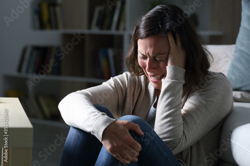 Fotografie, Tablou Sad middle age woman crying sitting in the night at home