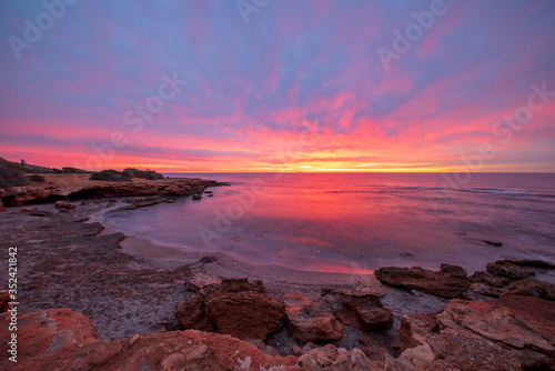 Fototapeta Naklejka Na Ścianę i Meble -  Sunrise on the beach of Oropesa del Mar, Costa Azahar