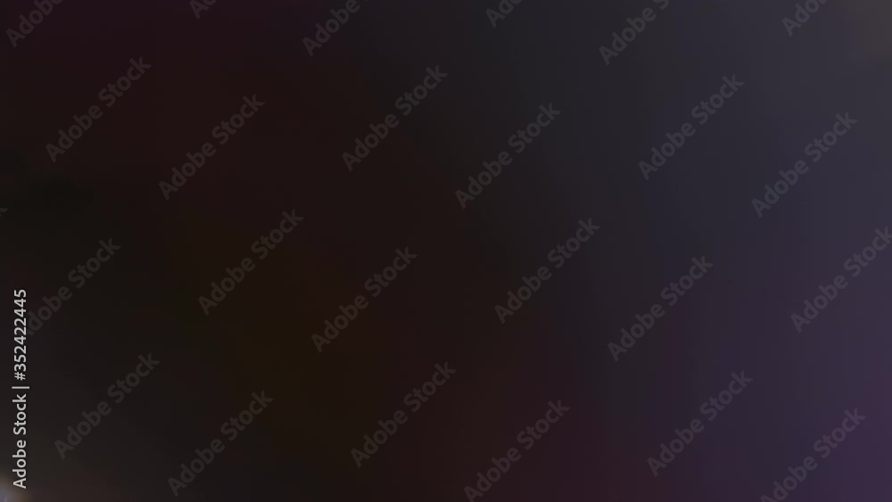 Colorful glitter, spots and flares in lens from a bright light source on a black background as additional material during montage, or as background
Colorful glitter, spots and flares in lens from a bright light source on a black background as additional material during montage, or as background