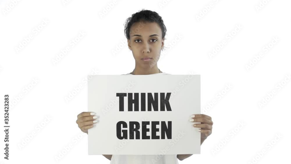 Afro-American Girl Activist With Think Green Poster on white background Afro-American Girl Activist With Think Green Poster on white background