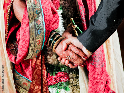 hands of a woman in traditional clothing wedding 