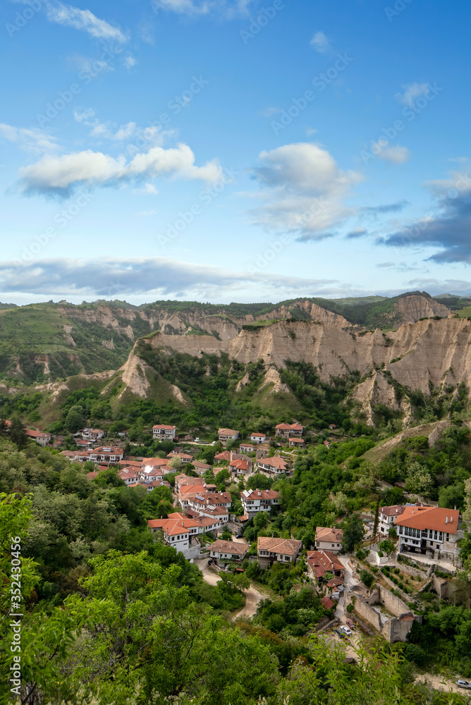 Panorama of Melnik, Bulgaria and sand pyramids from above. Beautiful landscape of the smallest bulgarian town, mountains at spring.