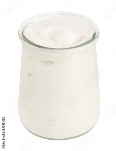 Homemade yogurt in glass bowl isolated on white