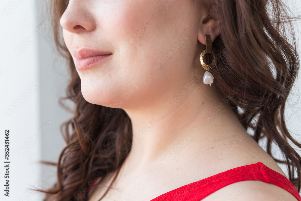 Close-up of woman wearing a Jewelry, bijouterie and accessories. Close-up of woman wearing a Jewelry, bijouterie and accessories.