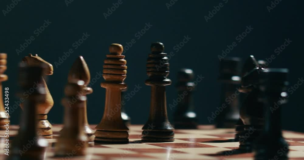 Chess figures spread on the chess board 4K video.