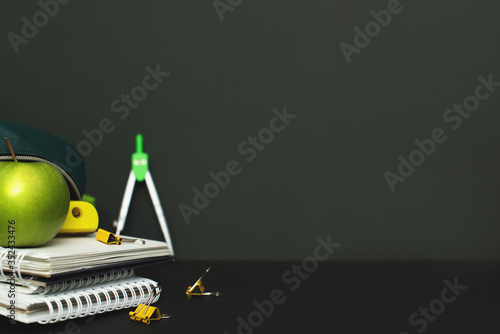 Back to School Concept with Stationery Supplies and Blackboard