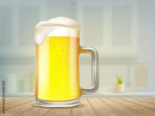 Mug of beer standing on a wooden table.