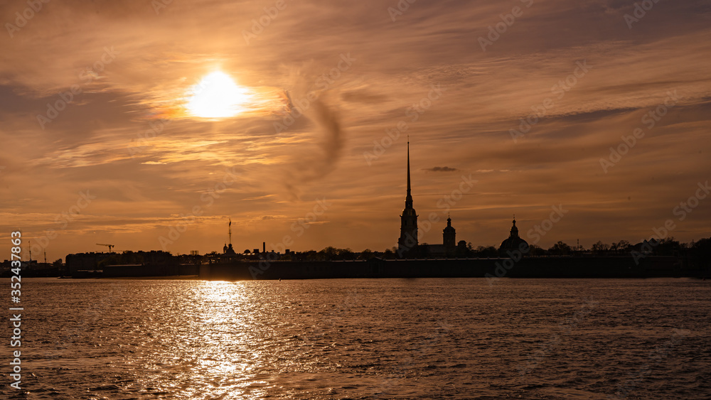 Russia, Saint Petersburg. Peter and Paul fortress and the Neva river at sunset in Saint Petersburg. 