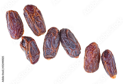 Date fruits isolated on a white background, top view.