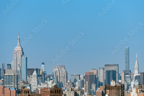 Wide panorama image of skyscrapers in Manhattan, New York at daytime