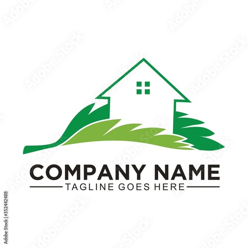 Home and leaf logo design concept