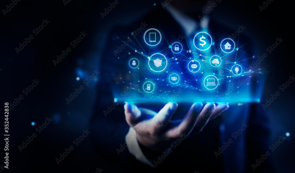 hand pushing a button on a touch screen interface.
Businessman holding table and showing virtual hologram interface customer. hand pushing a button on a touch screen interface.
Businessman holding table and showing virtual hologram interface customer.