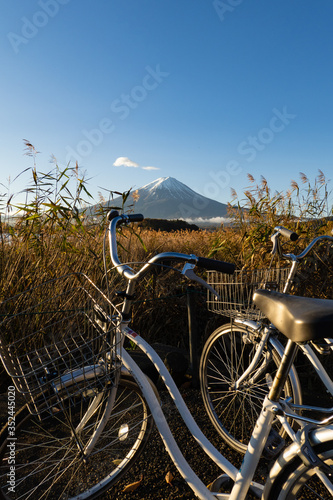 Mount Fuji view from Lake Kawaguchi with bicycles foreground, Yamanashi Prefecture, Japan.