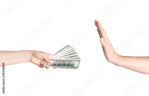 Stop corruption. Man refusing money given by female hand, isolated on white