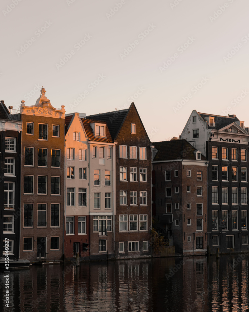 houses in amsterdam at sunset. A classic city scape 