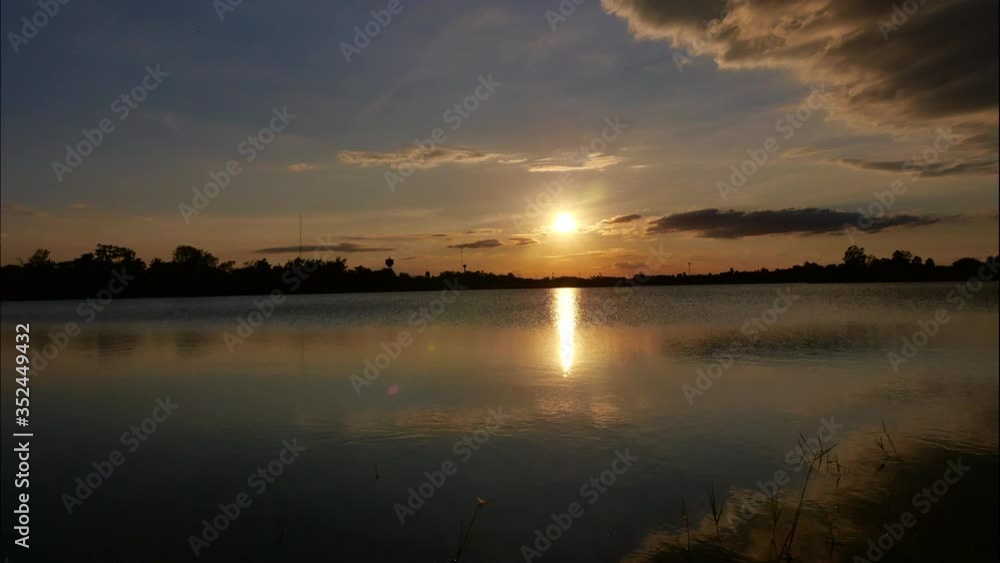 Timelapse of Sunset over the lake. Timelapse of Sunset over the lake.
