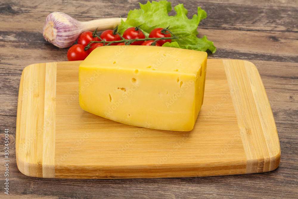 Hard yellow tasty cheese brick Hard yellow tasty cheese brick
