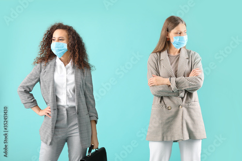 Young women in protective m...
