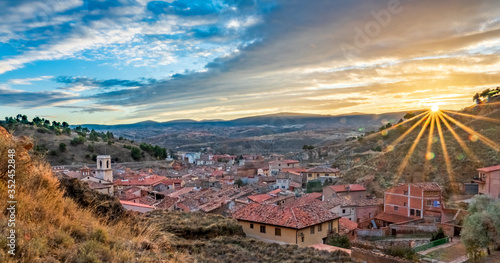 Sunset over Daroca antique village with tile roofs