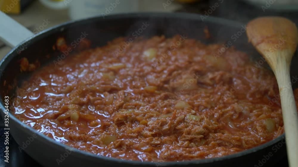 Roasting Tomato And Onion In a Frying Pan Roasting Tomato And Onion In a Frying Pan