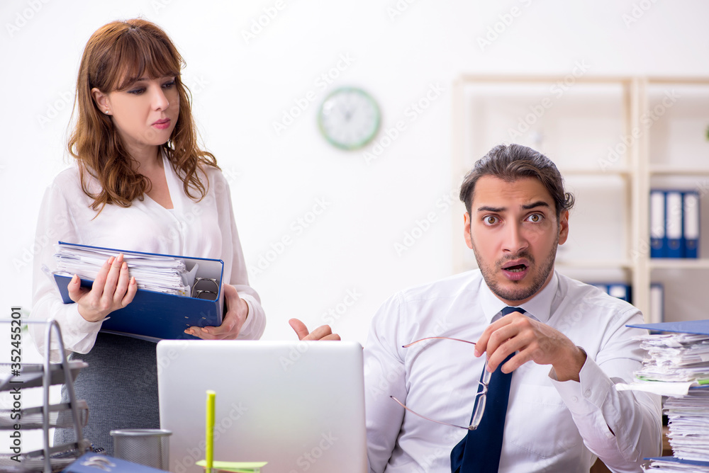 Fototapeta premium Two employees working in the office