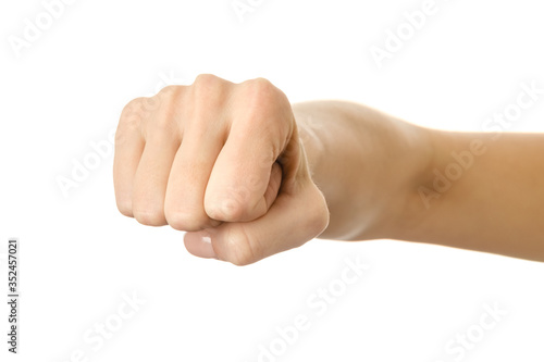 Hand clenched in a fist. Woman hand gesturing isolated on white