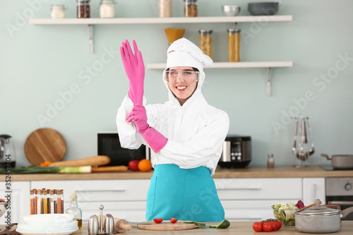 Housewife in protective cos...
