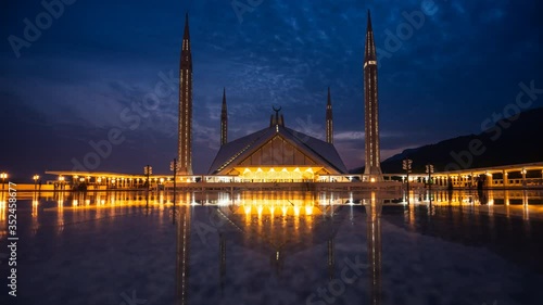 Time lapse of Faisal mosque from sunset to night, biggest mosque in Islamabad, Pakistan photo