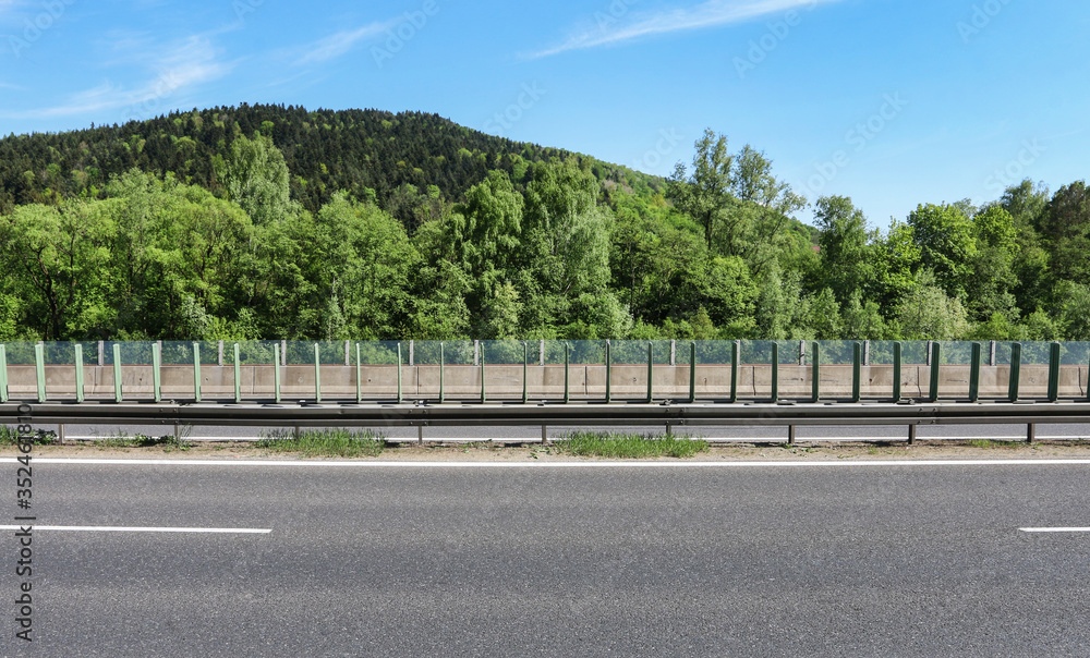 A multi-lane road passes through areas of high landscape value.