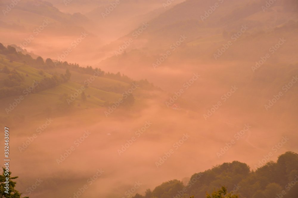 Stunning nature with misty landscape,Holbav village,Carpathians,Transylvania,Romania,Europe