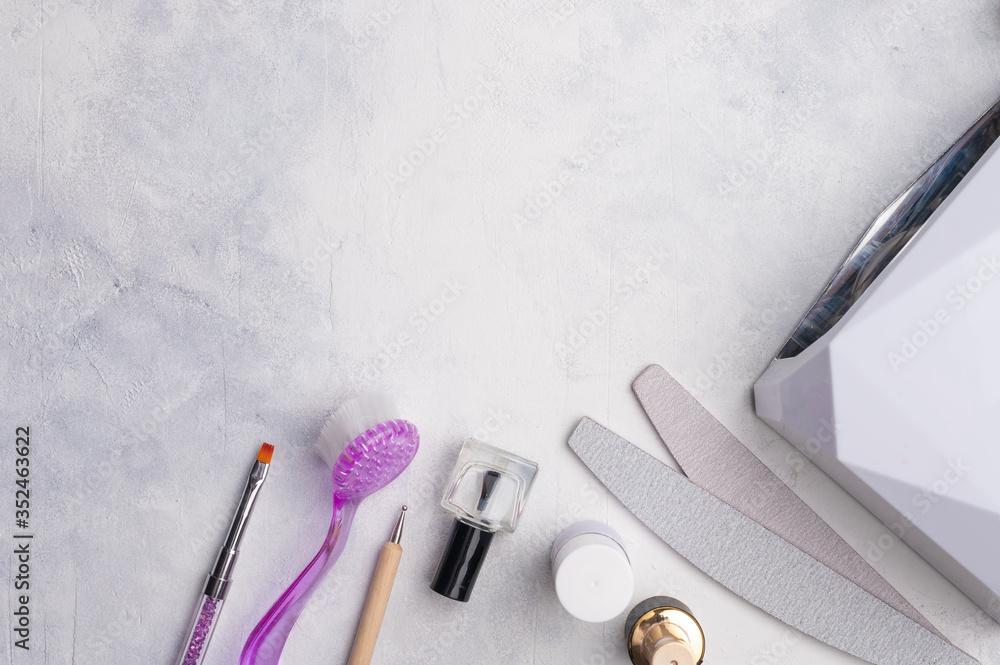 Beauty salon, nail care, light banner. Tools and gel polishes for working with nails Beauty salon, nail care, light banner. Tools and gel polishes for working with nails