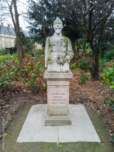 Beautiful stone statue of the general & computer scientist Henri Gouraud. Ajaccio square, Paris 7, France.