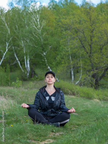 The girl is engaged in relaxation in nature