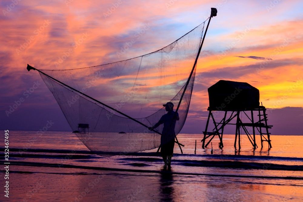 Artwork: fishermen catch fish by net