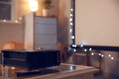 Modern video projector in room