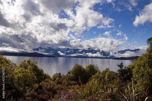 Clouds complete the beauty of Lake Manapouri. South Island of New Zealand
