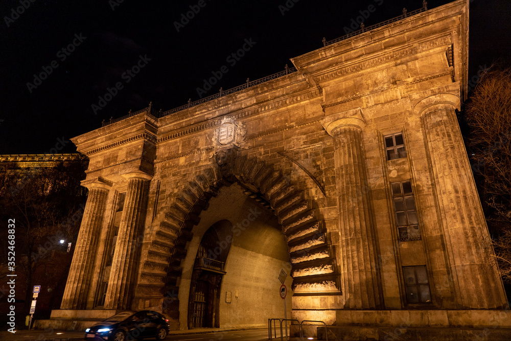 Traffic tunnel entrance with evening light on through Buda Castle in Budapest , Hungary in winter