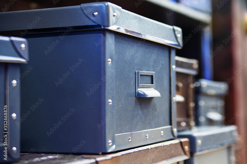 Rows of shelves with boxes. Cardboard box in warehouse. Rows of shelves with goods boxes in huge distribution .