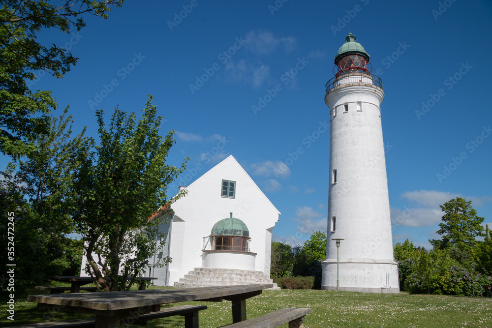 lighthouse on stevns with blue sky and clouds