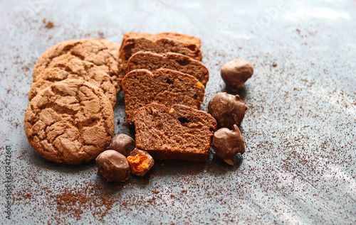 chocolate cake and oatmeal cookies close up