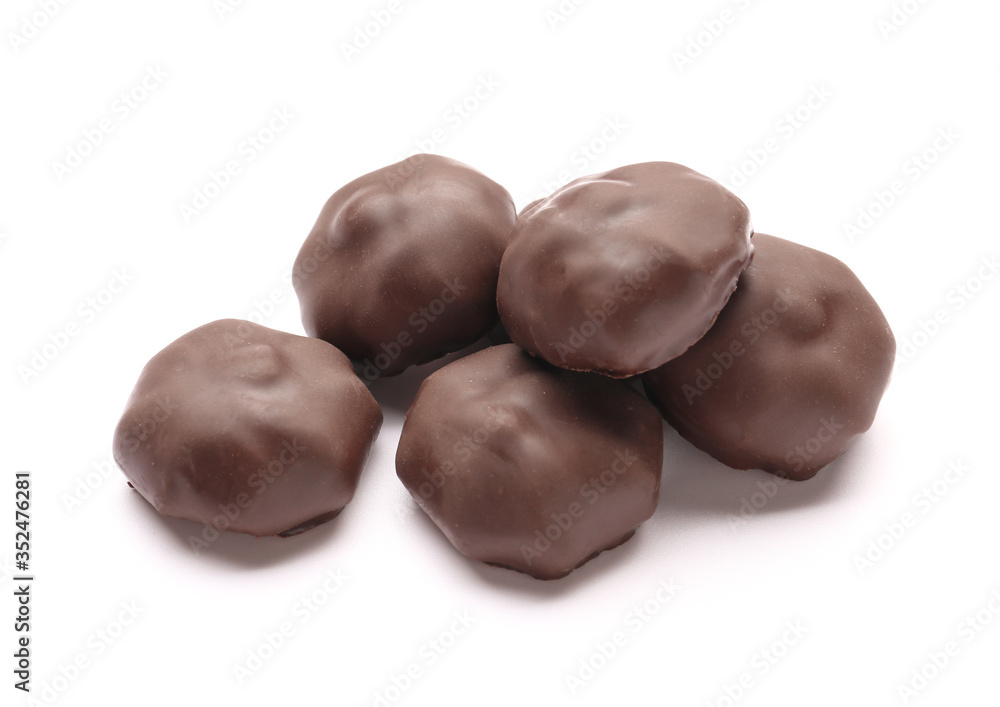 Tasty chocolate candies on white background Tasty chocolate candies on white background