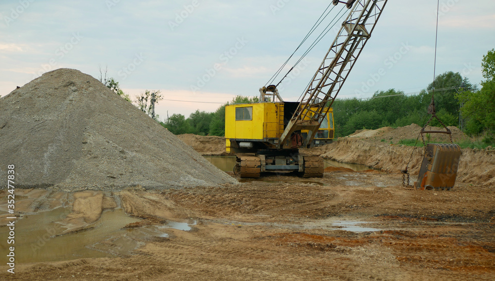 Mining gravel sand pit excavator digger dredger extraction machine colliery output quarry building gray pile mine surface grit quartz ballast, industry building material, hole devastation nature Mining gravel sand pit excavator digger dredger extraction machine colliery output quarry building gray pile mine surface grit quartz ballast, industry building material, hole devastation nature