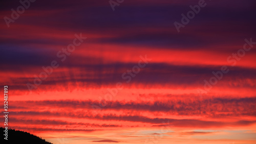 Dramatic red sunset sky in ...