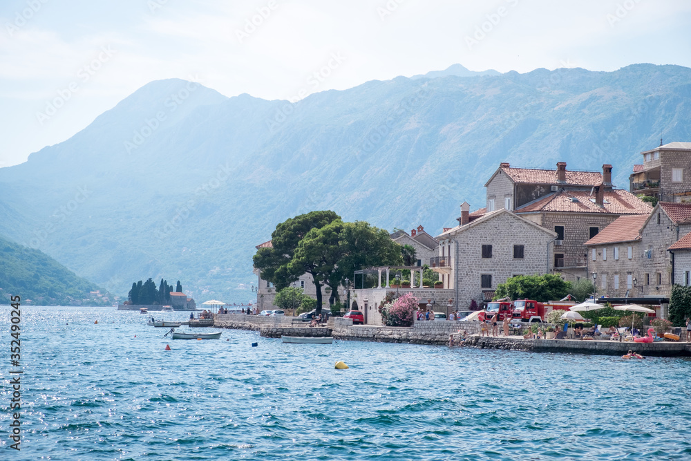 PERAST, MONTENEGRO - JULY 8, 2019: View of Perast city from sea side