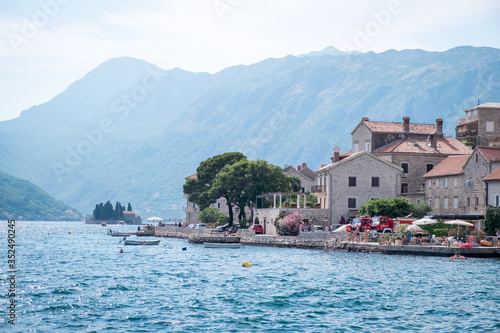 PERAST, MONTENEGRO - JULY 8, 2019: View of Perast city from sea side © Alexey Oblov